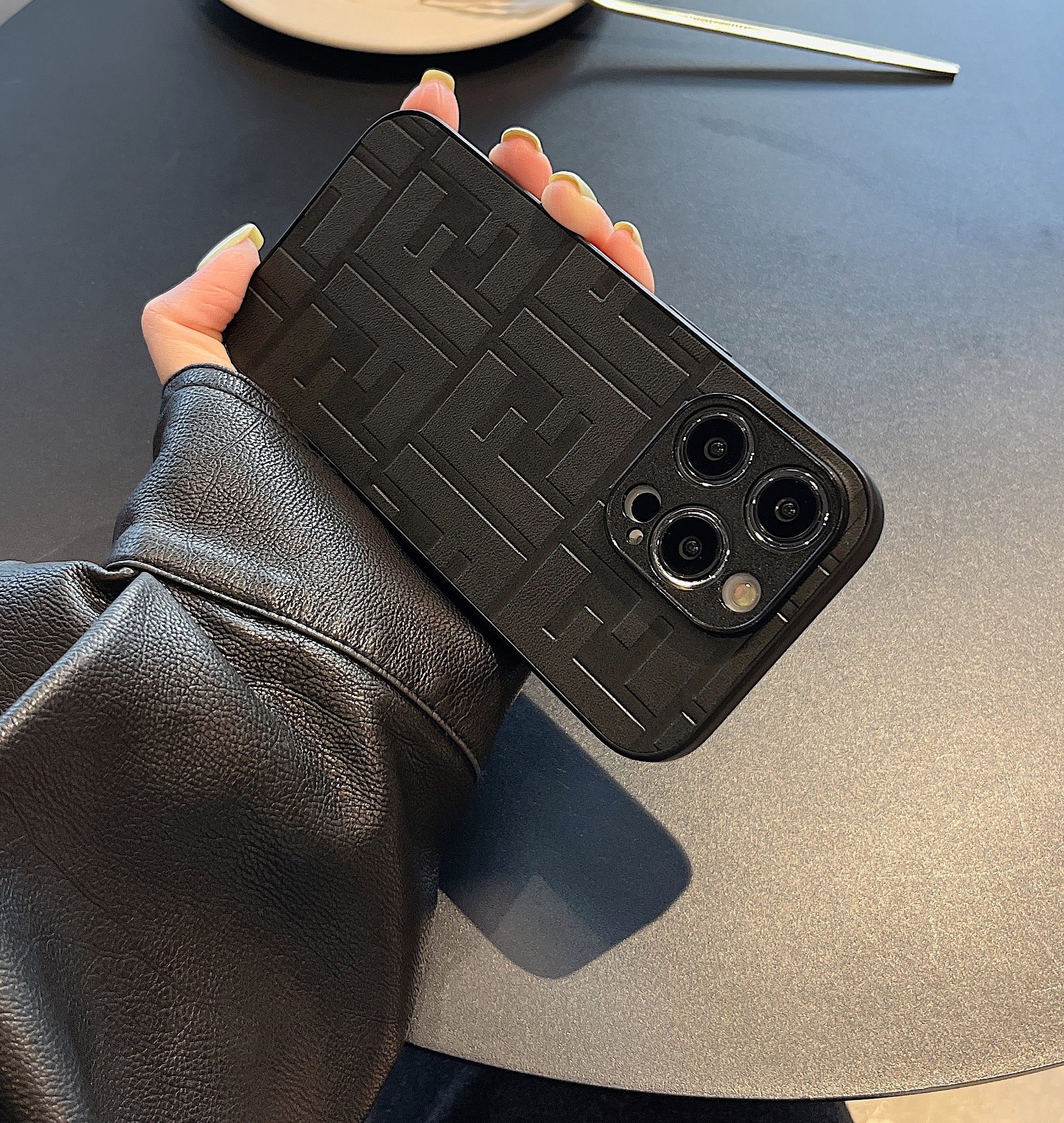 Embossed leather F case