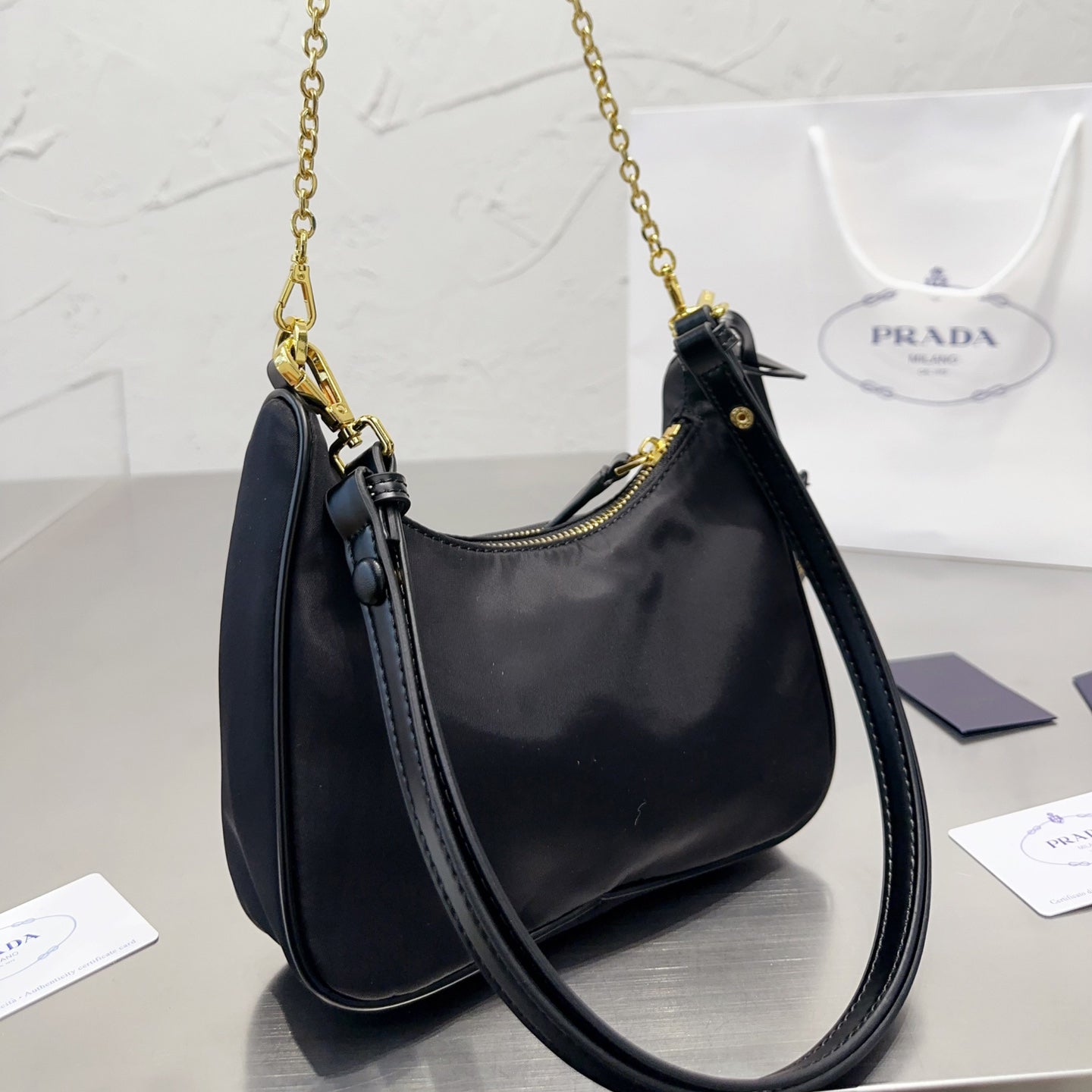 Re-Nylon and brushed leather mini-bag